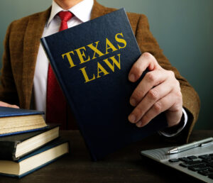 The lawyer offers a book withTexas law.